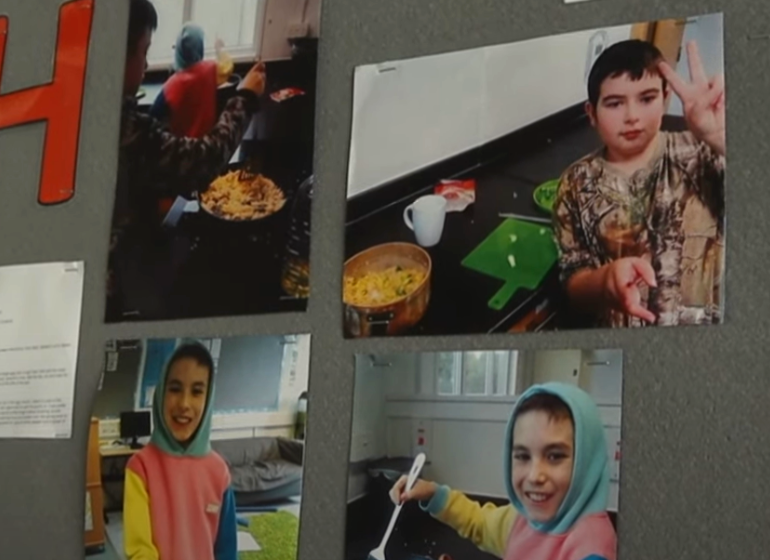 Display boards showing pupils cooking and smiling